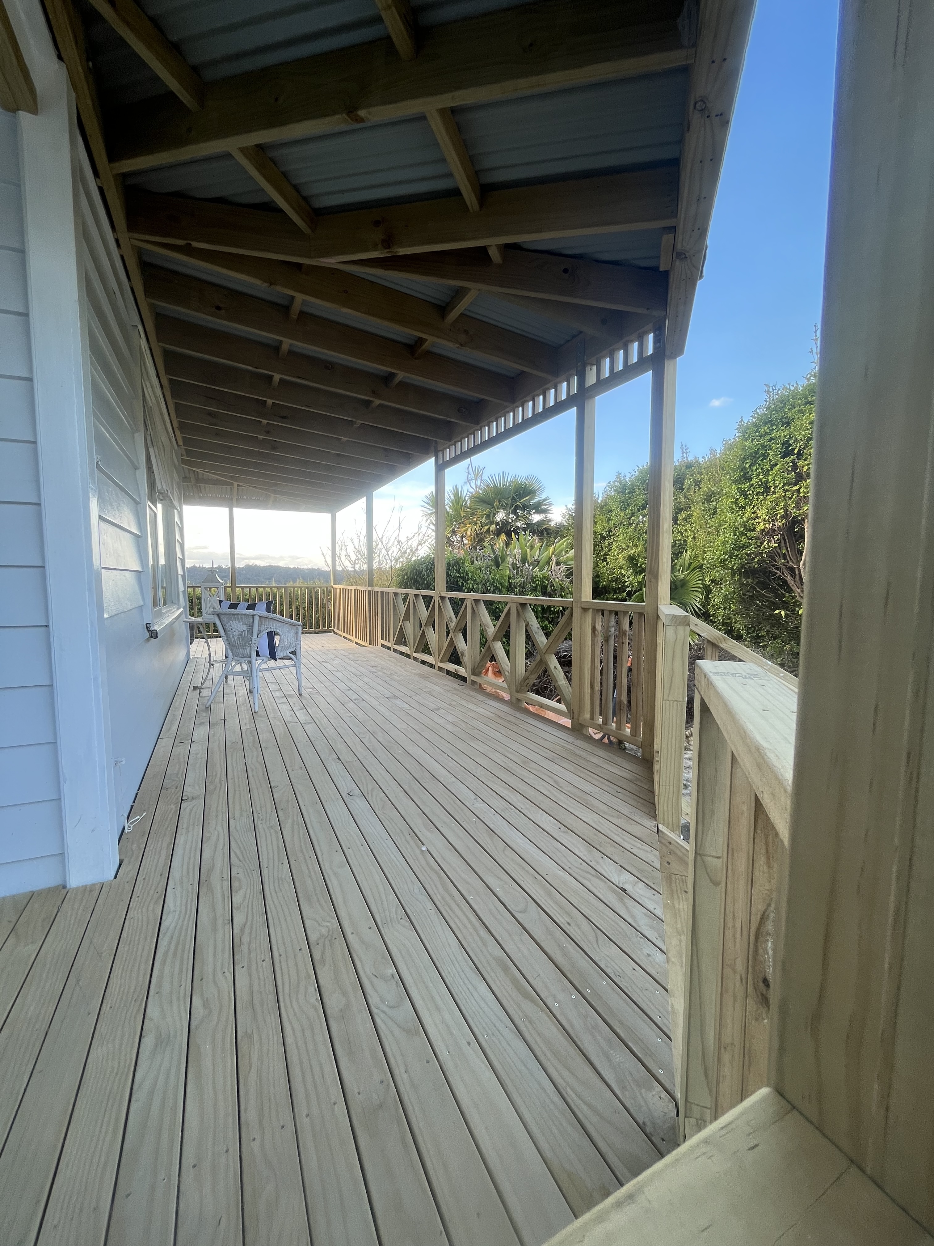 Covered Outdoor Living Deck by Coulter Construction Ltd